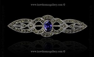 Silver Marcasite Brooch Set With An Amethyst Stone