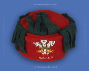 Child’s Red Welsh Fleece Hat With Fringe & 3 Feather Motif