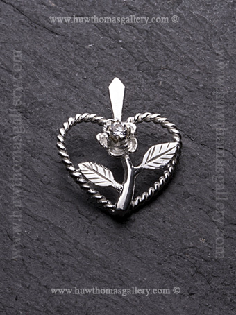 Heart Shaped Rose Pendant In Silver